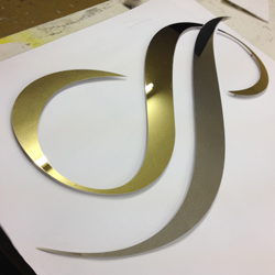 polished gold office sign